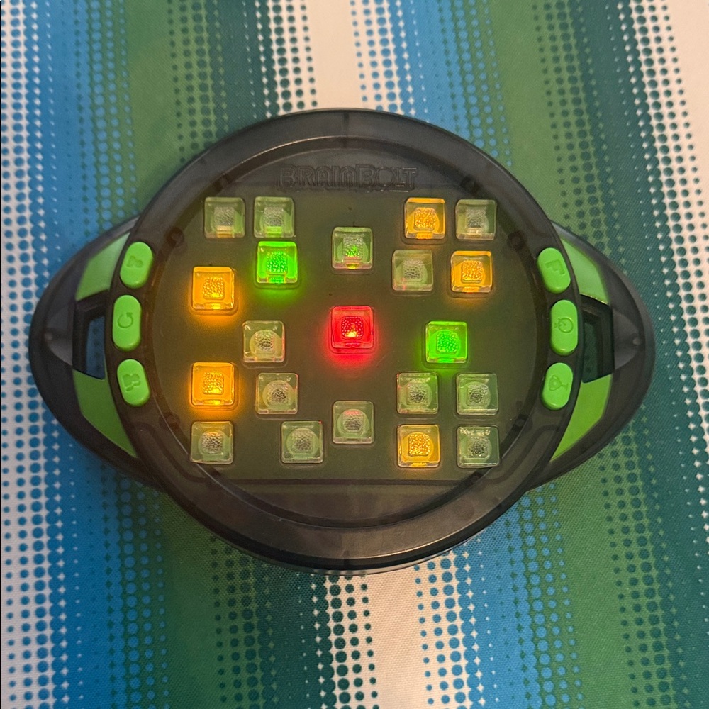 BrainBolt Electronic Logic Puzzle Game - Black & Green LED Brain Teaser